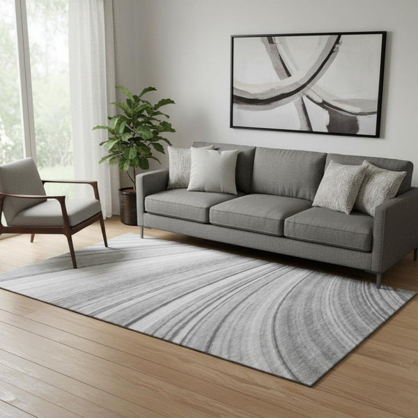 HomeRoots 5' X 8' Gray And Ivory Abstract Area Rug – Washable, UV-Protected, Durable for High-Traffic Spaces 650346