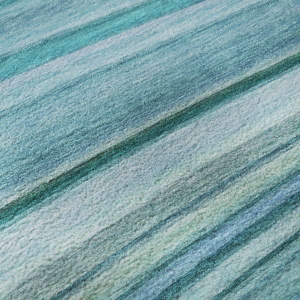 HomeRoots 5' Teal and Ivory Abstract Area Rug – Washable, UV Protected, Durable, Perfect for Family Spaces! 650352