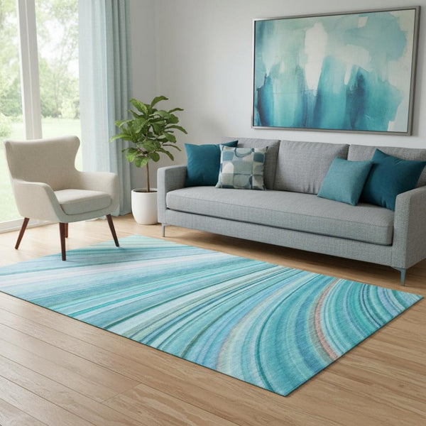 HomeRoots 5' Teal and Ivory Abstract Area Rug – Washable, UV Protected, Durable, Perfect for Family Spaces! 650352