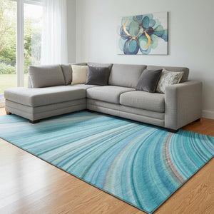 HomeRoots 9' X 12' Teal And Ivory Abstract Area Rug - Washable, UV Protected, Ideal for High-Traffic Spaces 650355