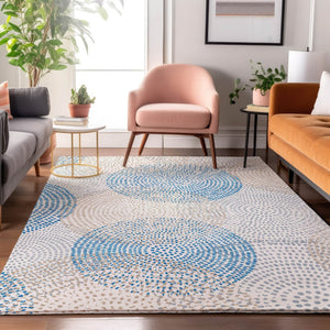 HomeRoots 5' X 8' Ivory and Blue Abstract Area Rug – Washable, UV-Protected, Durable for Kids and Pets 650364