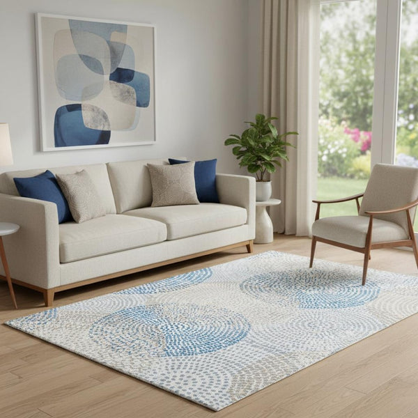 HomeRoots 5' X 8' Ivory and Blue Abstract Area Rug – Washable, UV-Protected, Durable for Kids and Pets 650364