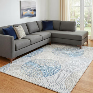 HomeRoots 8' X 10' Ivory and Blue Abstract Area Rug - Washable, UV-Protected, Stylish for High-Traffic Spaces 650366