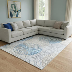 HomeRoots 10' X 14' Ivory and Blue Abstract Area Rug - Washable, UV Protected, Durable Style for High-Traffic Homes 650368