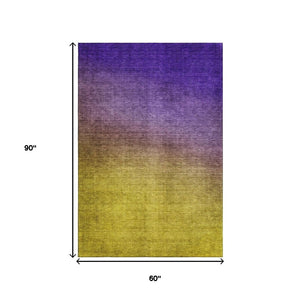 HomeRoots 5' X 8' Vibrant Purple Blue Gold Ombre Washable Area Rug with UV Protection for Stylish Spaces 650400