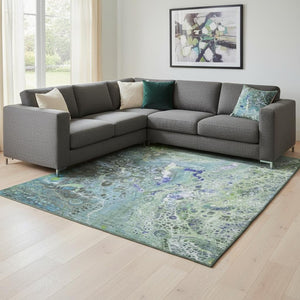 HomeRoots 9' Modern Abstract Area Rug in Green, Blue & Ivory - Washable, UV-Protected, Stain-Resistant Design 650427