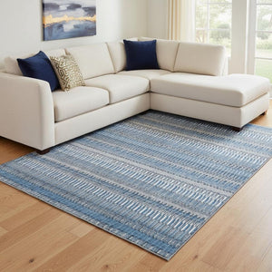 HomeRoots 8' X 10' Blue and Ivory Striped Washable Area Rug with UV Protection for Stylish High-Traffic Spaces 650462