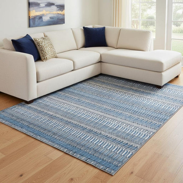 HomeRoots 8' X 10' Blue and Ivory Striped Washable Area Rug with UV Protection for Stylish High-Traffic Spaces 650462
