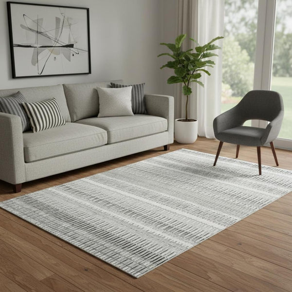 HomeRoots 5' X 8' Ivory & Gray Striped Washable Area Rug - Durable, UV-Protected, Perfect for High-Traffic Spaces 650484