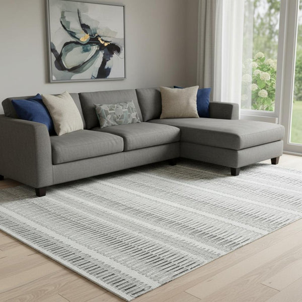 HomeRoots 9' X 12' Ivory and Gray Striped Washable Area Rug - UV Protected, Stain Resistant, Stylish Comfort 650487
