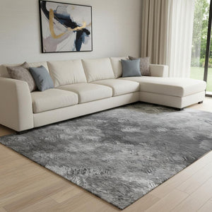 HomeRoots 9' X 12' Abstract Washable Area Rug in Gray, Silver & Black - UV Protected for High-Traffic Areas 650517