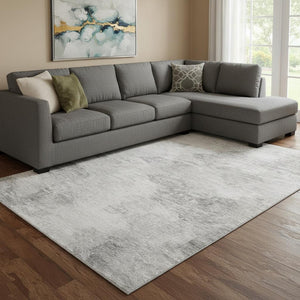 HomeRoots 9' X 12' Stylish Silver and Gray Abstract Washable Area Rug with UV Protection for High Traffic Areas 650643