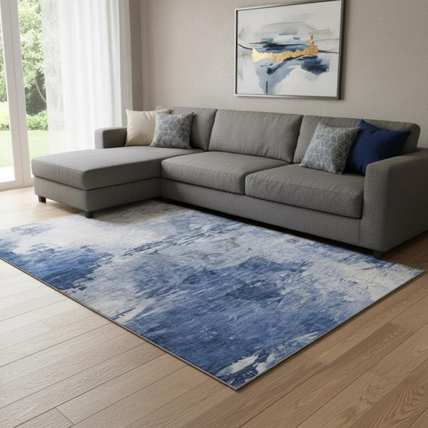 HomeRoots 8' X 10' Blue And Ivory Abstract Area Rug - Washable, UV Protected, Ideal for High-Traffic Homes 650720
