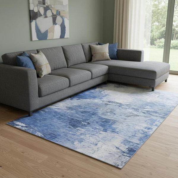 HomeRoots 9' X 12' Blue and Ivory Abstract Washable Area Rug - UV Protected, Stain-Resistant, Modern Style 650721