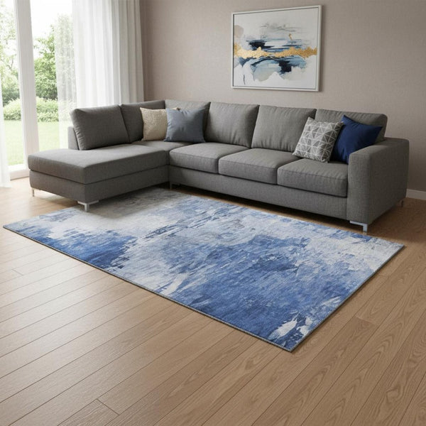 HomeRoots 10' Blue and Ivory Abstract Area Rug - Washable, UV Protected, Perfect for High-Traffic Spaces! 650722