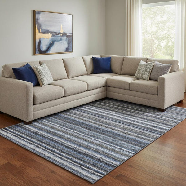 HomeRoots 9' X 12' Blue and Gray Striped Washable Area Rug with UV Protection for High-Traffic Spaces 650781