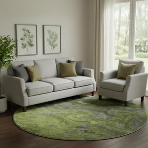 HomeRoots 8' Stylish Green, Gray & Ivory Abstract Round Rug - Washable, UV-Protected, Family-Friendly Design 650845