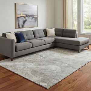 HomeRoots 8' X 10' Taupe Gray and Ivory Abstract Washable Area Rug with UV Protection for Modern Spaces 650858