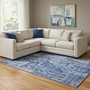HomeRoots 9' X 12' Blue Gray Ivory Abstract Area Rug - Durable, Washable, UV-Protected for High-Traffic Spaces 650871
