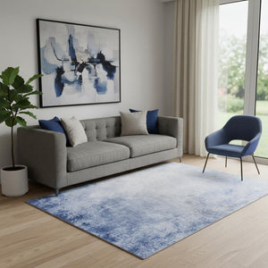 HomeRoots 5' X 8' Blue and Ivory Abstract Area Rug - Washable, UV Protected, Durable Design for High Traffic Areas 650904