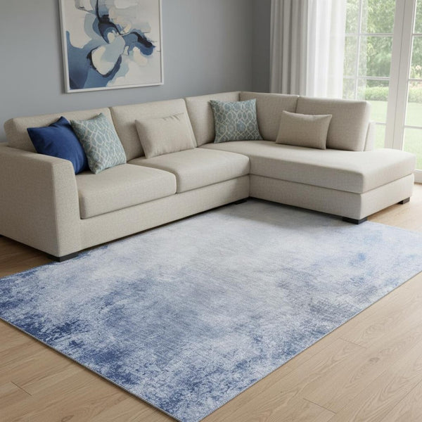 HomeRoots 8' X 10' Abstract Blue and Ivory Area Rug – Washable, UV Protected, Perfect for Busy Homes & Style! 650906
