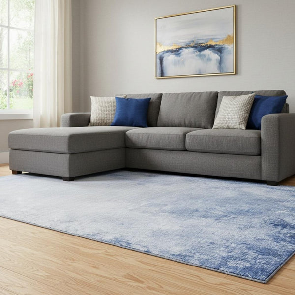 HomeRoots 9' X 12' Stylish Blue & Ivory Abstract Washable Area Rug with UV Protection for High-Traffic Spaces 650907