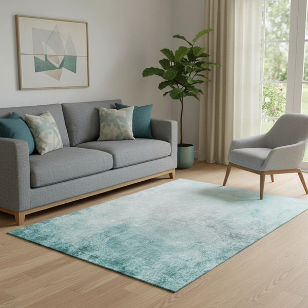 HomeRoots 5' X 8' Teal And Ivory Abstract Area Rug - Washable, UV Protected, Modern Design for Easy Care Spaces 650910