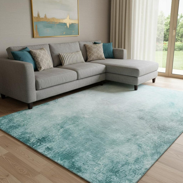 HomeRoots 10' X 14' Teal and Ivory Abstract Area Rug - Washable, UV-Protected, Stain-Resistant for Modern Spaces 650914