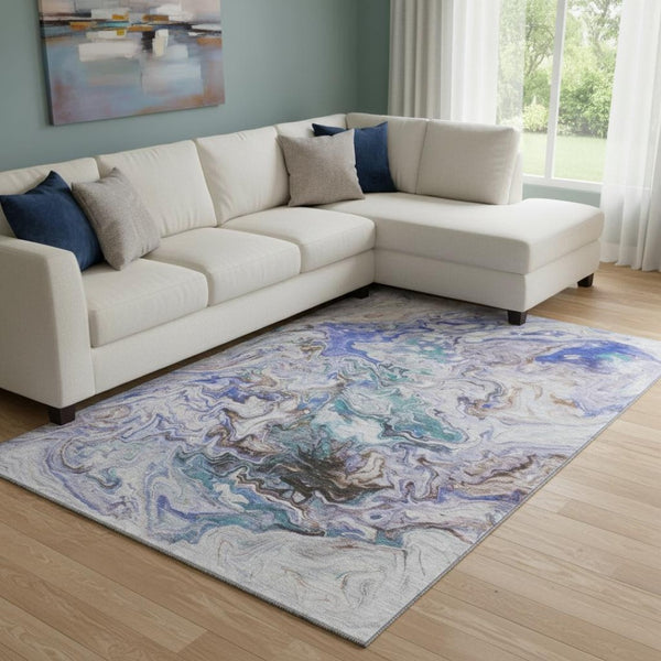HomeRoots 8' X 10' Abstract Beige, Blue & Ivory Washable Area Rug with UV Protection for High-Traffic Areas 650948