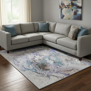 HomeRoots 10' Beige, Blue & Ivory Abstract Washable Area Rug - Durable, Stain Resistant & UV Protected Design! 650950