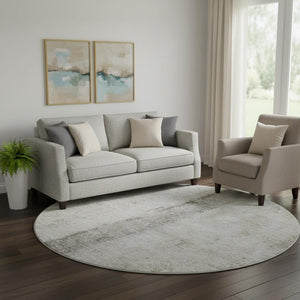 HomeRoots 8' Taupe Gray and Ivory Abstract Round Rug - Durable, Washable, UV-Protected, Ideal for High-Traffic Areas 651055