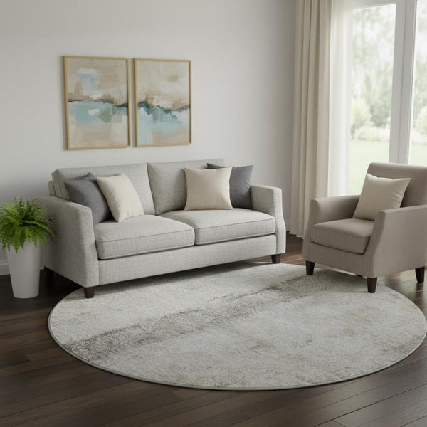 HomeRoots 8' Taupe Gray and Ivory Abstract Round Rug - Durable, Washable, UV-Protected, Ideal for High-Traffic Areas 651055
