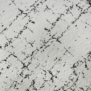 HomeRoots 5' Black and Ivory Abstract Washable Area Rug - UV Protected, Durable, Stylish for Any Room 651060
