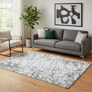 HomeRoots 5' Black and Ivory Abstract Washable Area Rug - UV Protected, Durable, Stylish for Any Room 651060