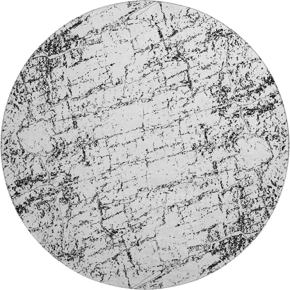 HomeRoots 8' Black And Ivory Abstract Round Rug - Washable, UV Protected, Modern Design for Busy Homes 651061