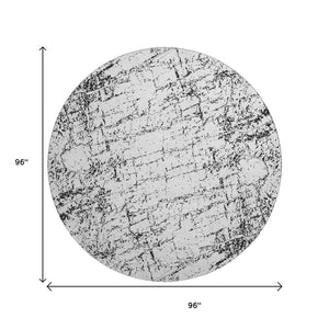 HomeRoots 8' Black And Ivory Abstract Round Rug - Washable, UV Protected, Modern Design for Busy Homes 651061