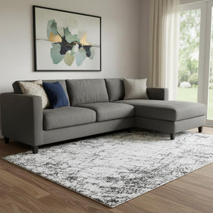 HomeRoots 9' X 12' Black And Ivory Abstract Area Rug – Stylish, Washable, Stain Resistant & UV Protected Design 651063