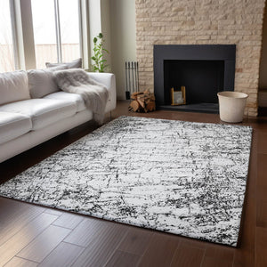 HomeRoots 10' X 14' Black and Ivory Abstract Area Rug - Washable, UV-Protected, Durable & Stylish for Your Home 651064