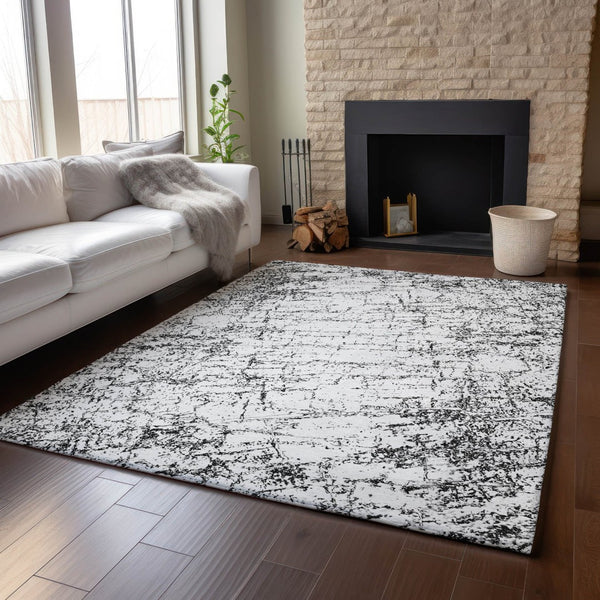 HomeRoots 10' X 14' Black and Ivory Abstract Area Rug - Washable, UV-Protected, Durable & Stylish for Your Home 651064