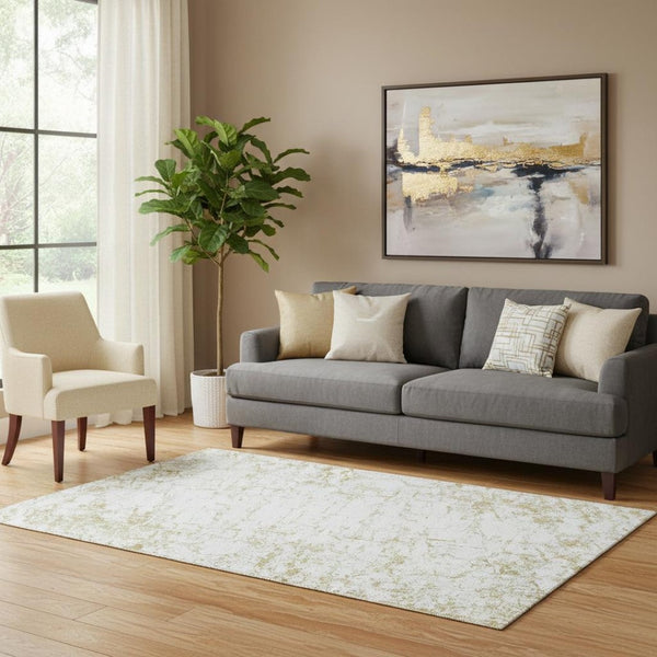 HomeRoots 5' Gold and Ivory Abstract Washable Area Rug - Stain Resistant, UV Protected, Perfect for Busy Homes 651072