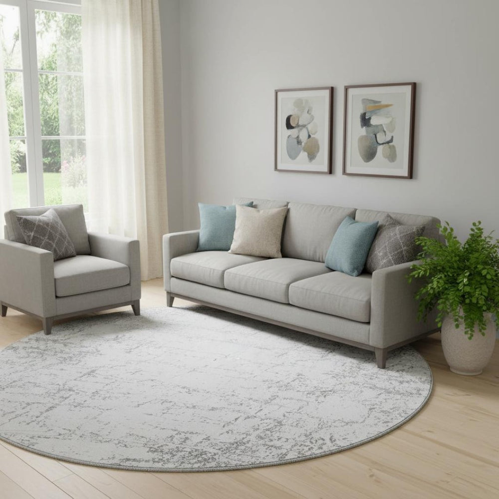 HomeRoots 8' Gray And Ivory Abstract Round Rug – Washable, UV Protected, Stain Resistant for High-Traffic Areas 651079
