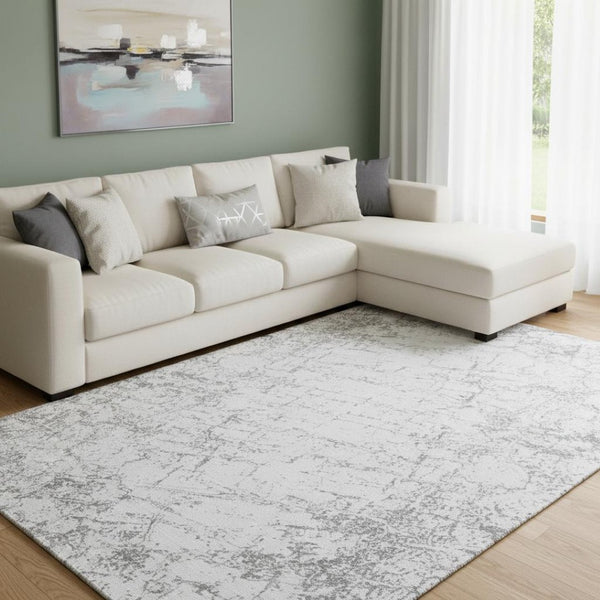 HomeRoots 9' X 12' Gray and Ivory Abstract Washable Area Rug with UV Protection for Stylish, Family-Friendly Living 651081
