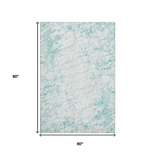 HomeRoots 5' X 8' Teal And Ivory Abstract Area Rug - Washable, UV Protected, Perfect for High-Traffic Spaces! 651084