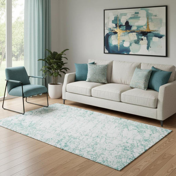 HomeRoots 5' X 8' Teal And Ivory Abstract Area Rug - Washable, UV Protected, Perfect for High-Traffic Spaces! 651084