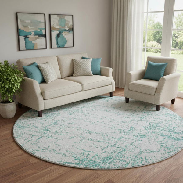 HomeRoots 8' Teal And Ivory Abstract Washable Round Rug - UV Protected, Durable, Stylish for Modern Homes 651085