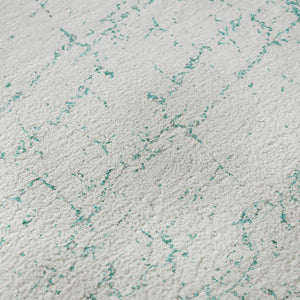 HomeRoots 8' Teal And Ivory Abstract Washable Round Rug - UV Protected, Durable, Stylish for Modern Homes 651085