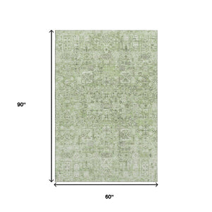 HomeRoots 5' X 8' Green and Ivory Floral Area Rug – Washable, UV-Protected, Durable Design for Busy Homes 651174