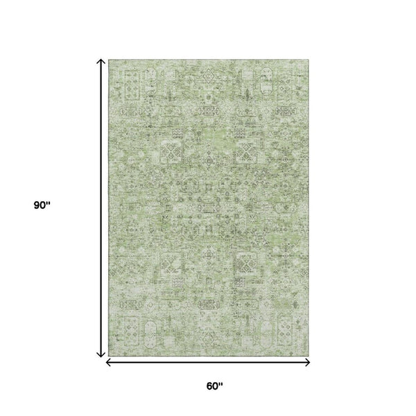 HomeRoots 5' X 8' Green and Ivory Floral Area Rug – Washable, UV-Protected, Durable Design for Busy Homes 651174