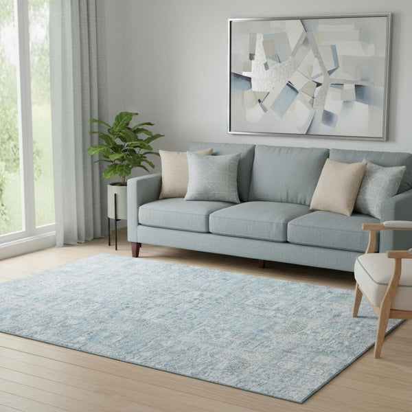 HomeRoots 5' X 8' Sky Blue Floral Area Rug - Washable, UV Protected, Stain-Resistant for Family-Friendly Spaces 651204