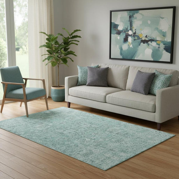 HomeRoots 5' X 8' Teal And Ivory Floral Area Rug - Durable, Stain Resistant, UV Protected for Everyday Use 651216